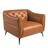 fauteuil de cuir brun avec capitonné